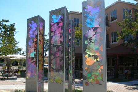 Columns with schools of colorful fish on sides in courtyard